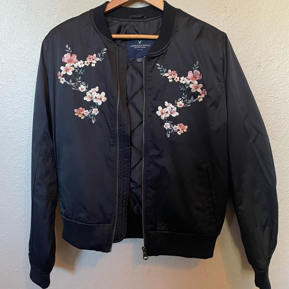 Black American Eagle Bomber Jacket with floral detail - Size Medium